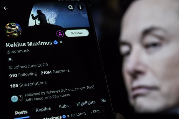 January 1, 2025, Bandung, West Java, Indonesia: In this photo illustration, Elon Musk X profile account is displayed on a smartphone with Elon musk profile in the background. Elon Musk changes their nicknames to Kekius Maximus on X.