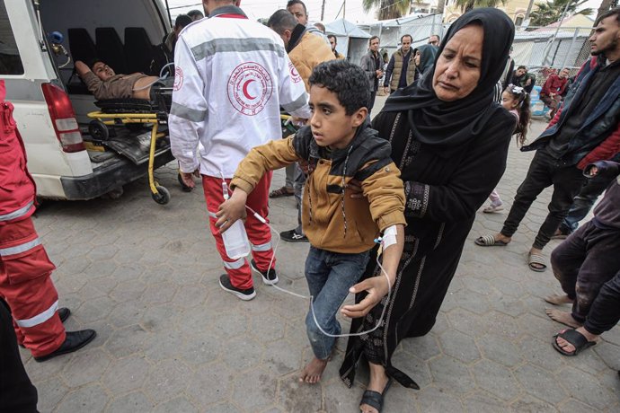 January 5, 2025, Dair El-Balah, Gaza Strip, Palestinian Territory: Palestinians transfer wounded and martyrs to Al-Aqsa Martyrs Hospital after Israeli warplanes targeted a group of citizens in Deir al-Balah in the central Gaza Strip, on 05 January 2025