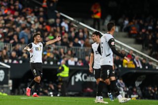Hugo Duro of Valencia CF celebrates a goal with teammates during the Spanish league, La Liga EA Sports, football match played between Valencia CF and Real Madrid at Mestalla stadium on January 3, 2025, in Valencia, Spain.