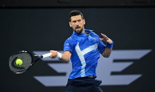 02 January 2025, Australia, Brisbane: Serbian tennis player Novak Djokovic plays a forehand return against France's Gael Monfils during their men's singles tennis match at the Brisbane International tennis tournament. Photo: Darren England/AAP/dpa