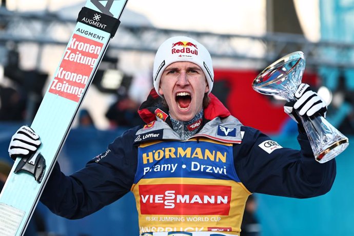 04 January 2025, Austria, Innsbruck: Austria's thirs-placed Daniel Tschofenig celebrates after the men's Large Hill Tournament at the FIS Ski Jumping World Cup. Photo: Daniel Karmann/dpa