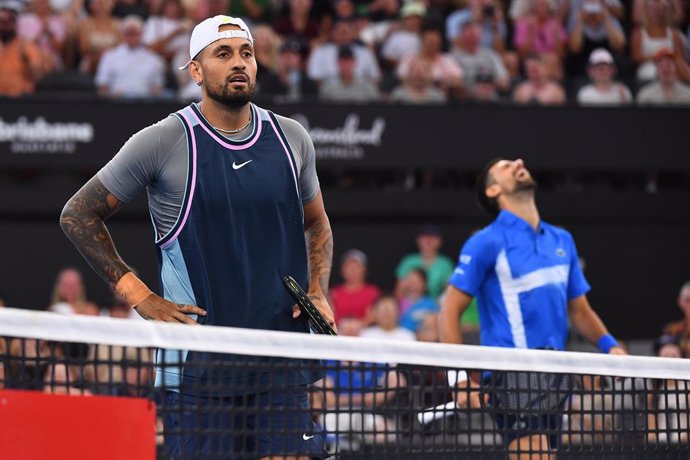 01 January 2025, Australia, Brisbane: Serbian tennis player Novak Djokovic and Australian tennis player Nick Kyrgios react during the Brisbane International Second Round doubles match agianst Croatian tennis player Nikola Mektic and New Zealander tennis p