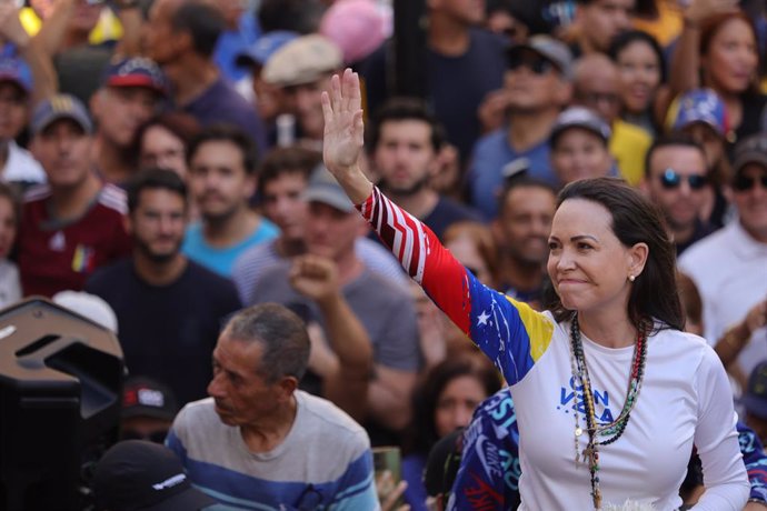 09 January 2025, Venezuela, Caracas: Venezuelan opposition leader Maria Corina Machado leads a demonstration against the re-inauguration of authoritarian President Nicolas Maduro. Machado, who had left her safe house for the first time in months to join t