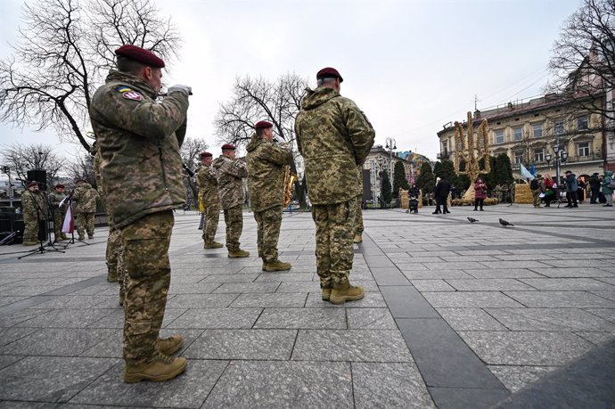 December 23, 2024, Lviv, Ukraine: LVIV, UKRAINE - DECEMBER 23, 2024 - The ceremony to install Ukraine's largest trident, also known as the tryzub, made of 340 didukhs (Ukrainian Christmas decoration made from a sheaf of wheat) takes place at the Taras She