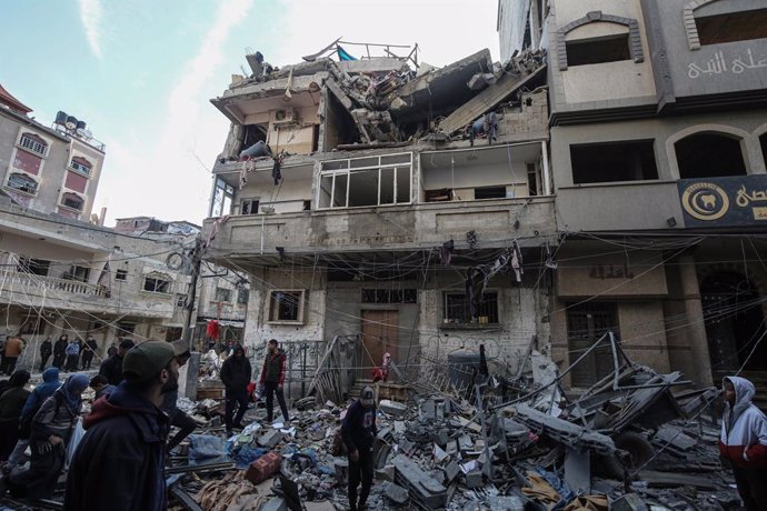 January 9, 2025, Nuseirat, Gaza Strip, Palestinian Territory: Palestinians inspect their damaged homes following Israeli attacks on the Nuseirat refugee camp in Gaza City, 09 January 2025. There were reports of deaths and injuries in the attack