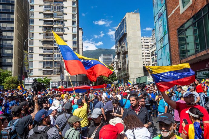 January 9, 2025, Caracas, Miranda, Venezuela: Opponents of the government of Nicolas Maduro, march in protest against the swearing in of Nicolas Maduro on January 10, 2025...Government and opposition marches and rallies prior to the presidential inaugurat