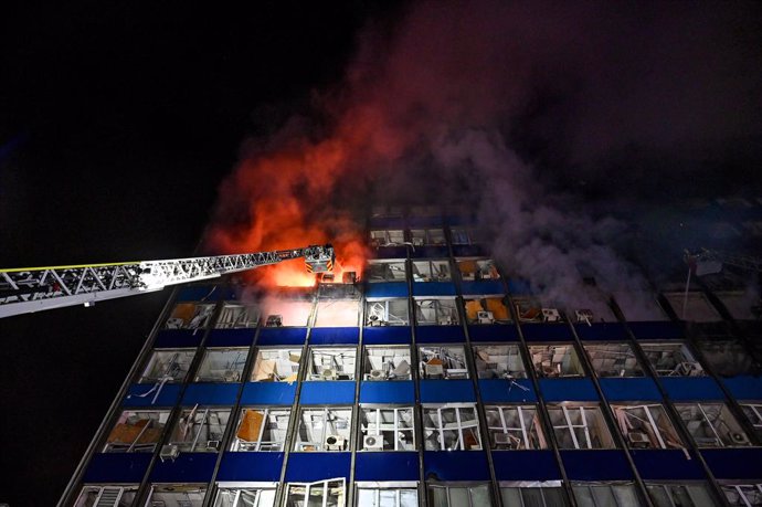 January 8, 2025, Zaporizhzhia, Ukraine: ZAPORIZHZHIA, UKRAINE - JANUARY 8, 2025 - Firefighters extinguish a fire caused by an air strike by Russian troops on the industrial infrastructure of Zaporizhzhia, southeastern Ukraine