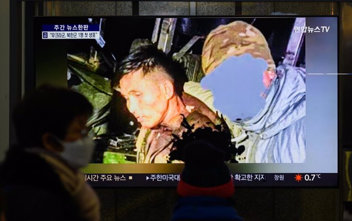 December 28, 2024, Seoul, South Korea: A 24-hour Yonhap news TV broadcast at Yongsan Railway Station shows suspected North Korean soldier reportedly captured by the Ukrainian military in this undated photo captured from Telegram. An injured North Korean s