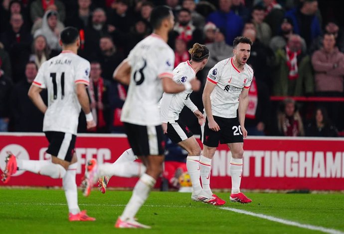 14 January 2025, United Kingdom, Nottingham: Liverpool's Diogo Jota celebrates scoring his sides first goal during the English Premier League soccer match between Nottingham Forest and Liverpool at City Ground. Photo: Mike Egerton/PA Wire/dpa