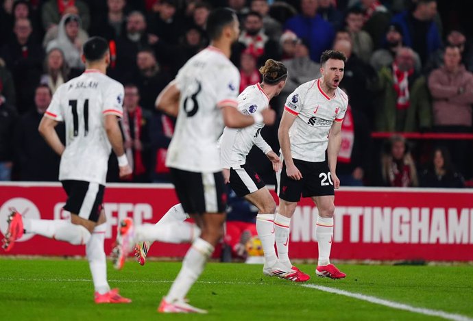 14 January 2025, United Kingdom, Nottingham: Liverpool's Diogo Jota celebrates scoring his sides first goal during the English Premier League soccer match between Nottingham Forest and Liverpool at City Ground. Photo: Mike Egerton/PA Wire/dpa