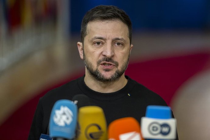 December 19, 2024, Brussels, Bxl, Belgium: Ukraine's President Volodymyr Zelensky  talks to the press upon arrival at the European Council Summit in Brussels, Belgium on 19/12/2024 Leaders of member states gather to discuss continued military, economic, a