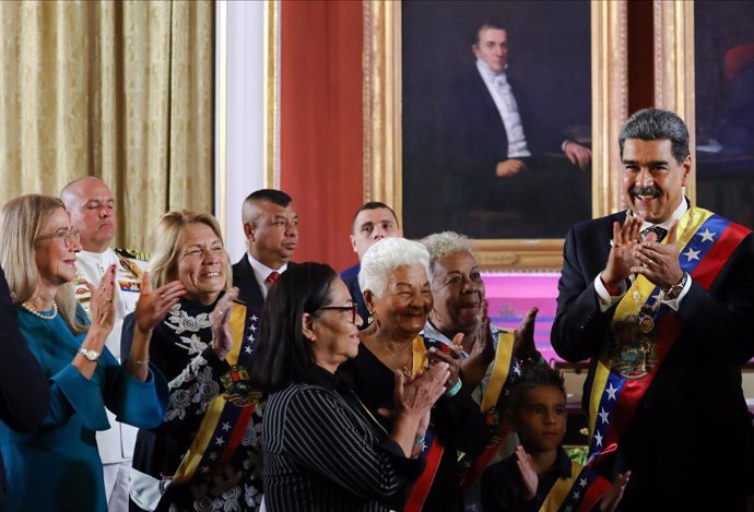 CARACAS, Jan. 11, 2025  -- Nicolas Maduro (1st R) applauds after he took the oath as Venezuelan president for a third term in Caracas, Venezuela, Jan. 10, 2025.   Nicolas Maduro on Friday was sworn in as Venezuelan president for a third term.   Taking the