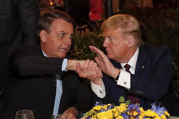 Archivo - Jair Bolsonaro y Donald Trump.