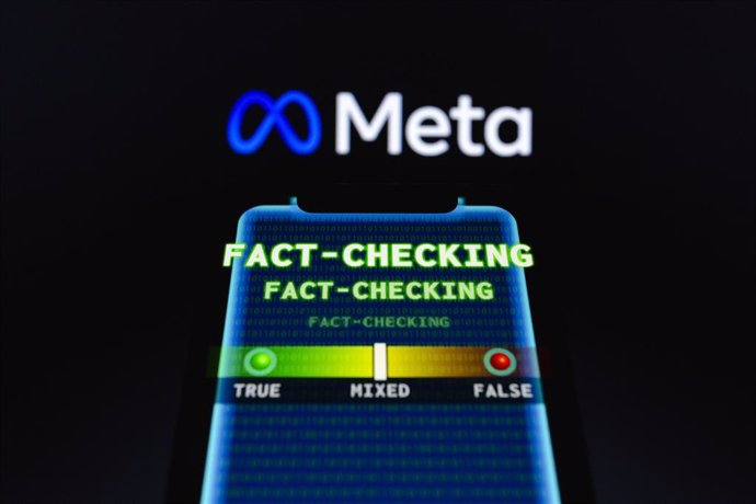 08 January 2025, Paraguay, Asunción: Meta Platforms logo is displayed behind the term "fact-checking" and visual representation of "true false" meter on a smartphone. Photo: Andre M. Chang/ZUMA Press Wire/dpa