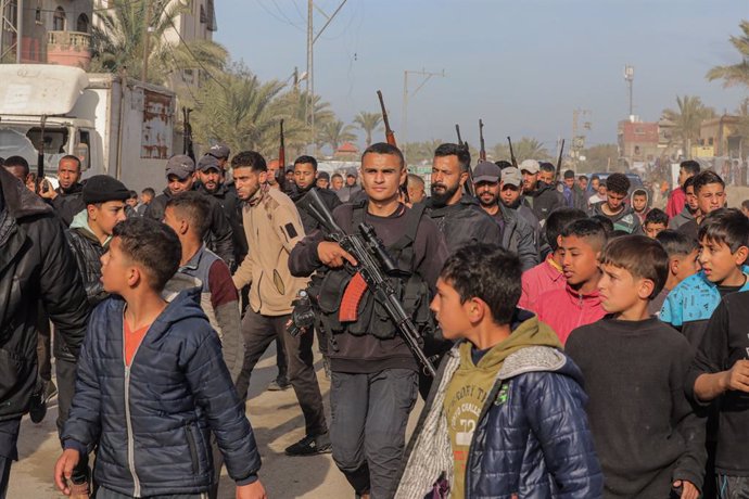 January 19, 2025, Deir Al-Balah, Gaza Strip, Palestinian Territory: Members of the Hamas security forces deploy in Deir al-Balah in the central Gaza Strip on January 19, 2025