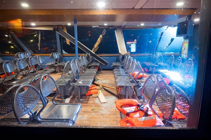 20 January 2025, Hamburg: Borken chairs and glass in the passenger area of the ferry moored at the Dockland jetty. Eleven people were injured when a transport vessel collided with a ferry on the Elbe river in the northern German port city of Hamburg, the 