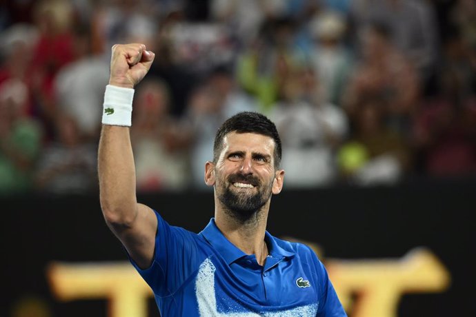 21 January 2025, Australia, Melbourne: Serbian tennis player Novak Djokovic reacts after winning his men's singles quarterfinal tennis match against Spain's Carlos Alcaraz on day ten of the Australian Open tennis tournament at Melbourne Park. Photo: Joel 