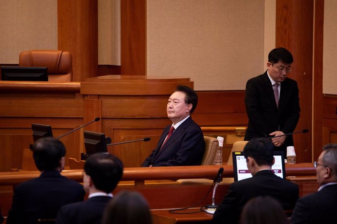 SEOUL, Jan. 21, 2025  -- South Korea's arrested President Yoon Suk-yeol attends the third formal hearing of his impeachment trial at the constitutional court in Seoul, South Korea, Jan. 21, 2025.