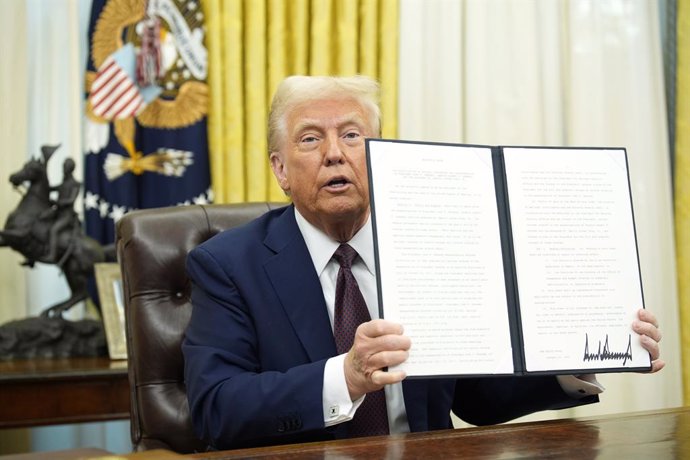 January 23, 2025, Washington, District Of Columbia, USA: United States President Donald J. Trump signs executive orders in the Oval Office of the White House in Washington, DC on January 23, 2025