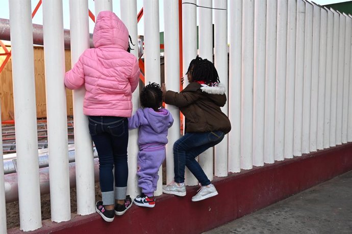 January 20, 2025, Tijuana, Baja California, Mexico: Migrant children from Haiti play as they wait for their CBP One appointments at the El Chaparral border port in Tijuana, Mexico. US President Donald Trump during his inauguration said that he will issue 