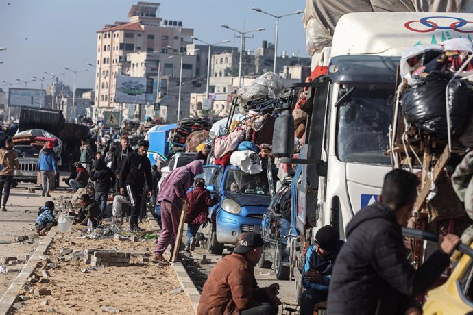 January 26, 2025, Nusairat, Gaza Strip, Palestinian Territory: Palestinians wait to be allowed to return to their homes in northern Gaza after they were displaced to the south at Israel's order during the war, amid a ceasefire between Israel and Hamas, in