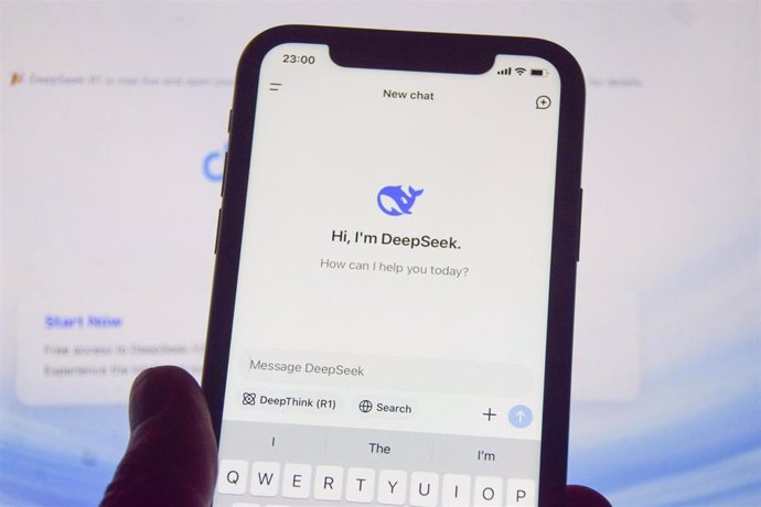 27 January 2025, United Kingdom, London: In this photo illustration, the DeepSeek app is seen on a phone screen with the DeepSeek website in the background.