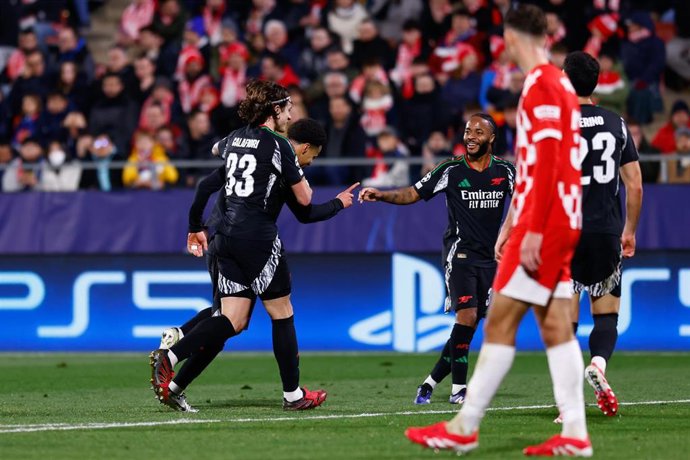 Ethan Nwaneri of Arsenal FC celebrates a goal with teammates during the UEFA Champions League 2024/25 League Phase MD8 match between Girona FC and Arsenal FC at Estadio de Montilivi on January 29, 2025, in Girona, Spain.