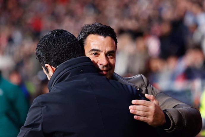 Miguel Angel "Michel" Sanchez, head coach of Girona FC, saludates to Mikel Arteta, head coach Arsenal FC during the UEFA Champions League 2024/25 League Phase MD8 match between Girona FC and Arsenal FC at Estadio de Montilivi on January 29, 2025, in Giron