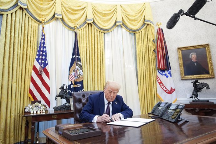 January 23, 2025, Washington, District Of Columbia, USA: United States President Donald Trump signs executive orders in the Oval Office of the White House in Washington, DC on January 23, 2025