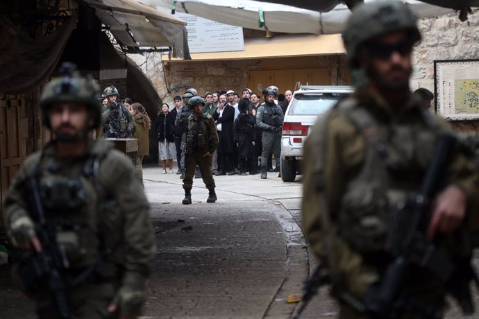 January 11, 2025, Hebron, West Bank, Palestinian Territory: Israeli settlers escorted by Israeli forces participate in a provocative tour in Hebron city, West Bank on January 11, 2024