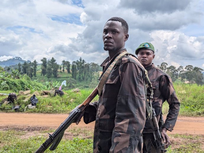 NORTH KIVU, Jan. 16, 2025  -- Soliders stand on guard in the Lubero territory of the eastern province of North Kivu, Democratic Republic of the Congo (DRC), Jan. 14, 2025. About 200,000 people have been displaced in the eastern DRC, due to intense fightin