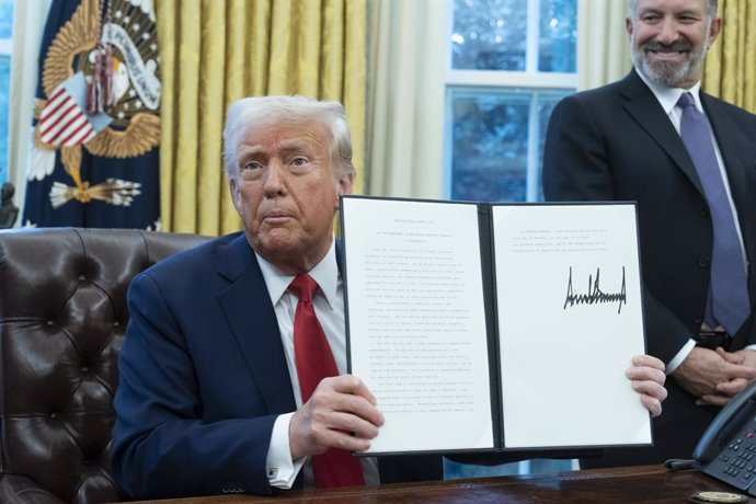 February 3, 2025, Washington, District Of Columbia, USA: United States President DONALD J TRUMP signs executive orders in the Oval Office of the White House in Washington.