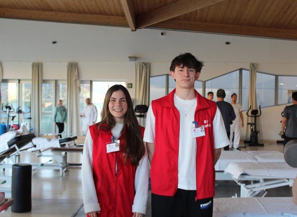 Dos de los nueve voluntarios que participan en el programa.