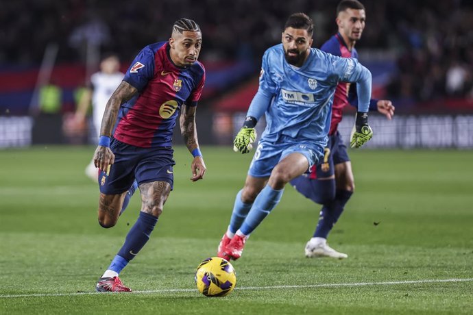 Raphinha Dias Belloli of FC Barcelona in action during the Spanish league, La Liga EA Sports, football match played between FC Barcelona and Valencia CF at Estadio Olimpico de Montjuic on January 26, 2025 in Barcelona, Spain.