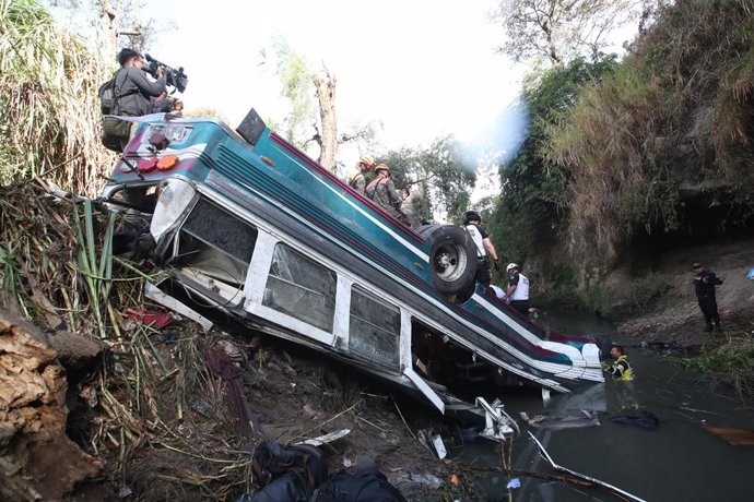 GUATEMALA CITY, Feb. 10, 2025  -- Rescuers work at the site of a bus accident in Guatemala City, Guatemala, on Feb. 10, 2025. At least 51 people were killed after a bus carrying 75 people plunged into a ravine in Guatemala City on Monday, the firefighters