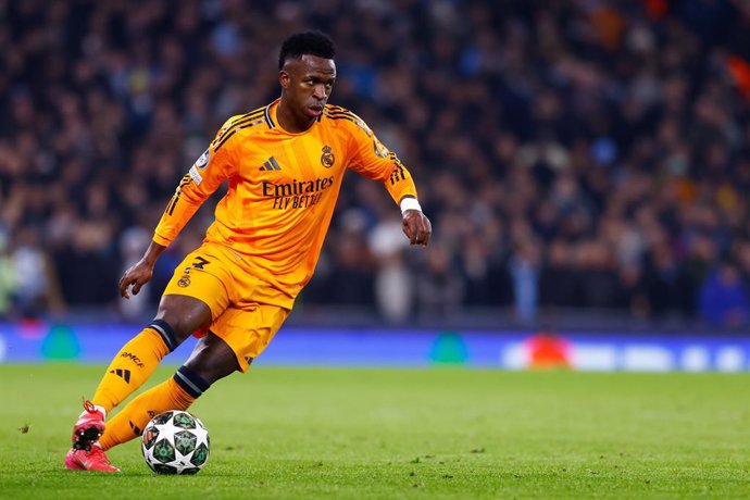 Vinicius Junior of Real Madrid in action during the UEFA Champions League 2024/25  League Knockout Play-off First Leg match between Manchester City and Real Madrid at Manchester City Stadium on February 11, 2025, in Manchester, England.