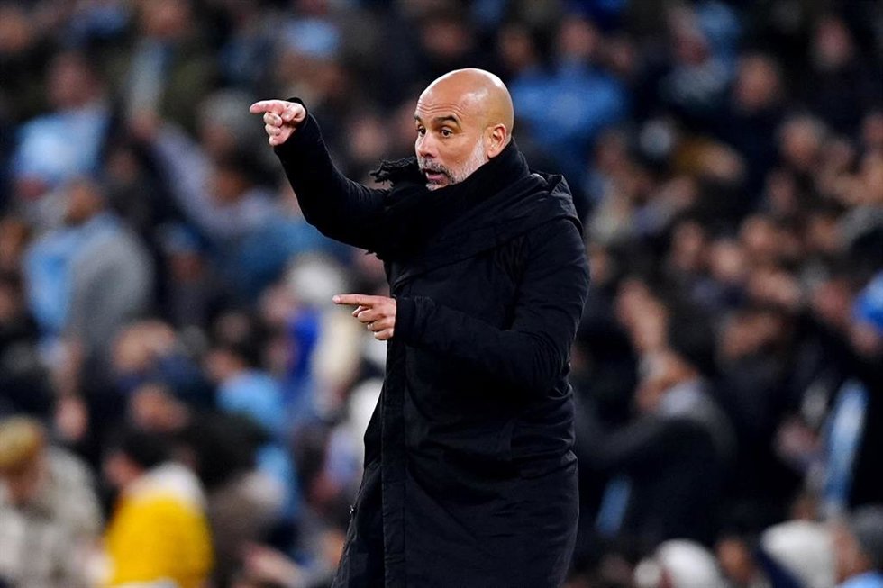 11 February 2025, United Kingdom, Manchester: Manchester City manager Pep Guardiola gestures on the touchline during the UEFA Champions League intermediate round first leg soccer match between Manchester City and Real Madrid at the Etihad Stadium. Photo