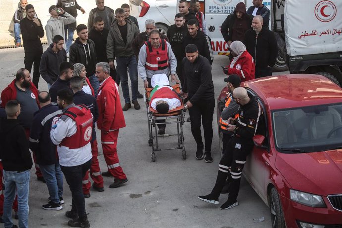 February 2, 2025, Jenin, West Bank, Palestine: Palestinian paramedics carry the body of a man killed during the large-scale Israeli military operation in the city of Jenin and its camp. The Israeli army forces blew up an entire residential block in the Je