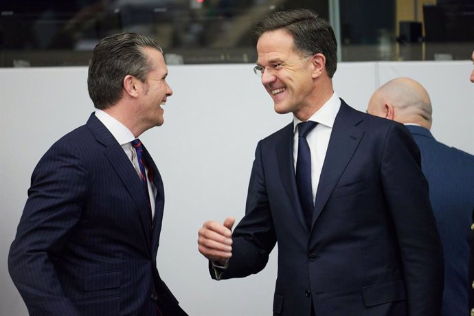 HANDOUT - 12 February 2025, Belgium, Brussels: US Secretary of Defense Pete Hegseth (L) talks with NATO Secretary General Mark Rutte during the Ukraine Defense Contact Group meeting at NATO Headquarters. Photo: -/NATO/dpa - ATTENTION: editorial use only a