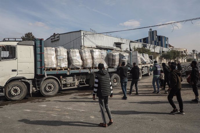 January 19, 2025, Rafah, Gaza Strip, Palestinian Territory: Trucks loaded with food and humanitarian aid enter the Gaza Strip through the Kerem Shalom crossing, on Salah al-Din Road in Rafah, southern Gaza Strip, Jan 19, 2025