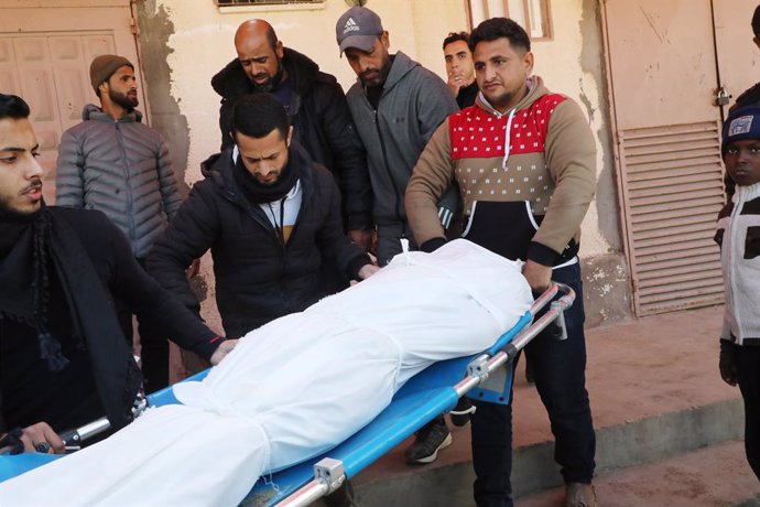 February 14, 2025, Dair El-Balah, Gaza Strip, Palestinian Territory: Family members mourn for 15-year-old Palestinian Enes Sikr Ahmed Nebahin, who was shot and killed by an Israeli sniper while checking his family home in the recently evacuated Juhur al-D