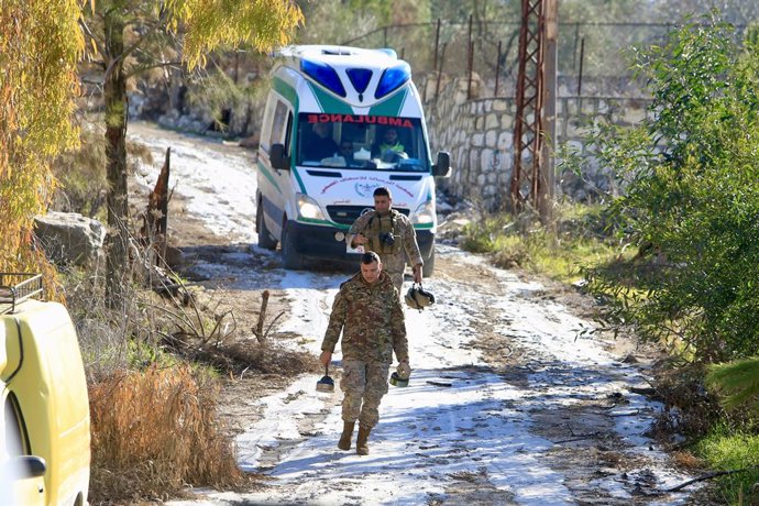 BINT JBEIL, Jan. 21, 2025  -- This photo shows Lebanese army soldiers collecting unexploded Israeli munitions in Bint Jbeil, Lebanon, on Jan. 20, 2025. Residents of the southern Lebanese border town of Bint Jbeil and the nearby village of Ainata have begu