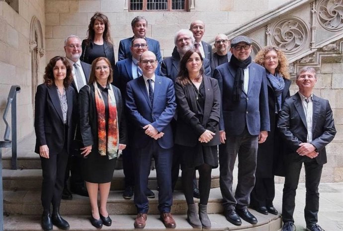 La consellera con los premiados