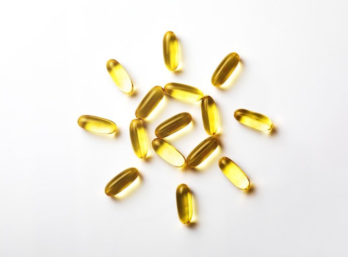 Archivo - Arquivo - Suplementos de vitamina D colocados para formar um sol, a principal fonte de vitamina D do corpo