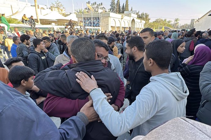 February 1, 2025, Dair El-Balah, Gaza Strip, Palestinian Territory: Former Palestinian prisoners released by Israel disembarks a Red Cross bus after arriving in Khan Yunis, in the south of Gaza Strip, on February 1, 2025. The inmates departed from the Isr