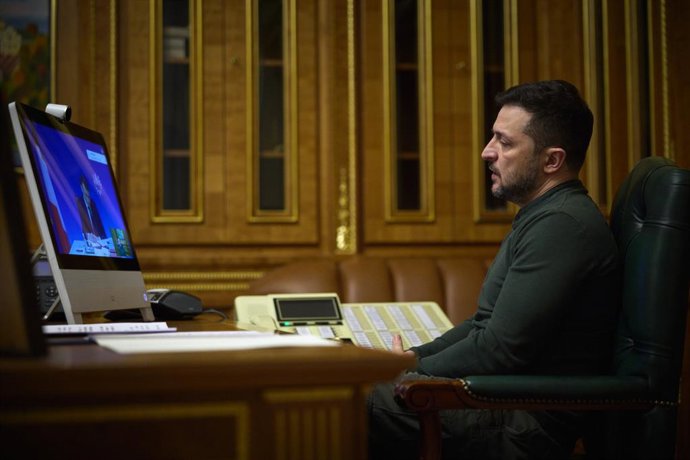 February 20, 2025, Kiev, Kyiv Oblast, Ukraine: Ukrainian President Volodymyr Zelenskyy, listens to French President Emmanuel Macron during a video conference meeting from the Mariinskyi Palace, February 20, 2025 in Kiev, Ukraine. The meeting comes on the 