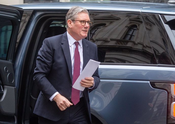 February 12, 2025, London, England, United Kingdom: UK Prime Minister KEIR STARMER returns to 10 Downing Street after PMQs.