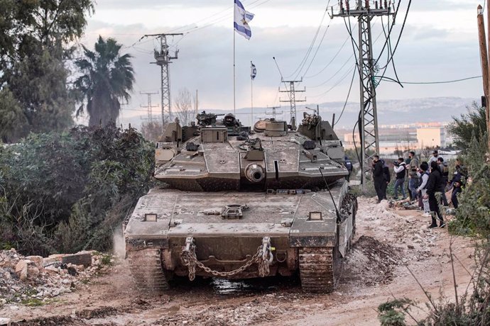 February 23, 2025, Jenin, West Bank, Palestine: Israeli military tanks participate in the military operation on the city and its camp. The Israeli Minister of Defense said that its forces will remain in the refugee camps for the next year and announced ex