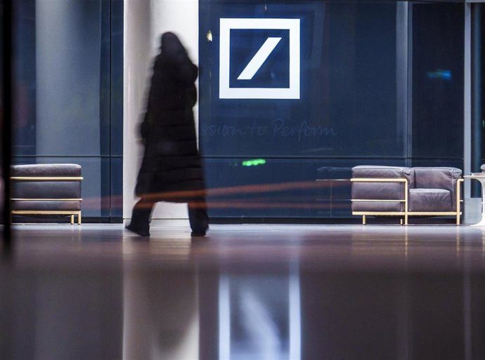 30 January 2025, Hesse, Frankfurt/Main: The Deutsche Bank logo is illuminated at the bank's headquarters as the company presents its annual figures for 2024. Photo: Andreas Arnold/dpa