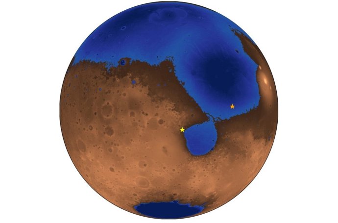 As áreas azuis mostram a profundidade do antigo mar, agora desaparecido, chamado Deuteronilus. A estrela laranja indica o local de pouso do explorador chinês Zhurong. A estrela amarela é o local de pouso do rover Perseverance da NASA.